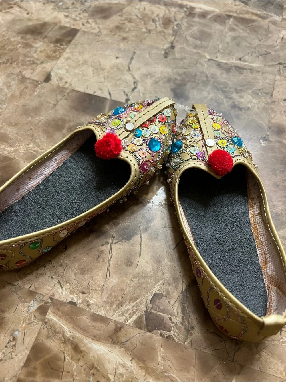 Embellished Gold kid Flats with Red Pom-Pom